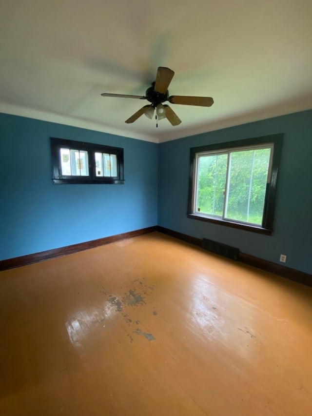 unfurnished room featuring ceiling fan and light hardwood / wood-style floors