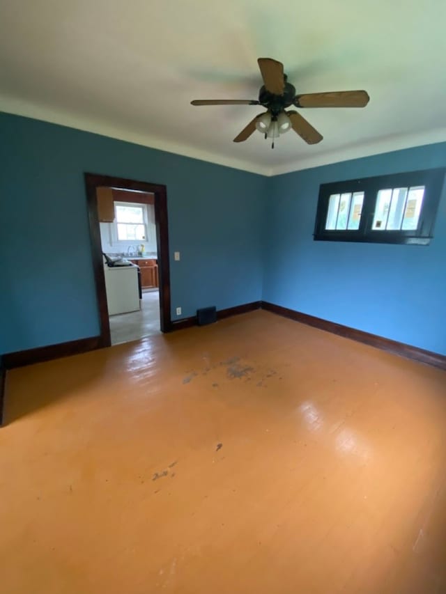 spare room featuring ceiling fan