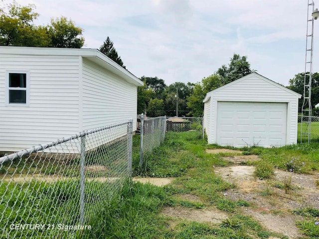 view of property exterior with an outdoor structure and a garage