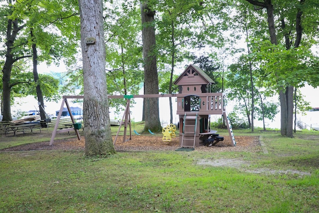 view of playground featuring a lawn