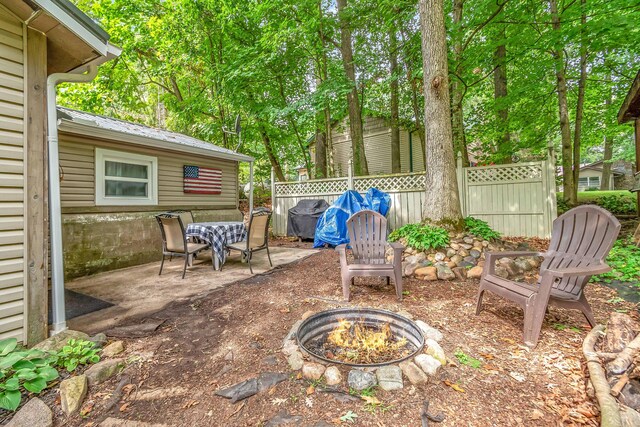 3558 Majestic Ct, Hillsdale, MI 49242 - view of patio / terrace with a fire pit