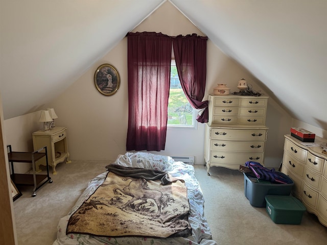 carpeted bedroom featuring lofted ceiling and a baseboard radiator