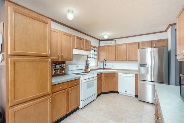 kitchen featuring a textured ceiling, white appliances, crown molding, and sink