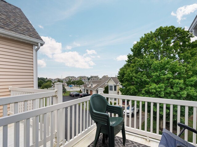 94 Charter Ct, Manistee, MI 49660 - deck with a residential view