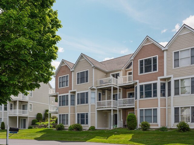 94 Charter Ct, Manistee, MI 49660 - view of building exterior