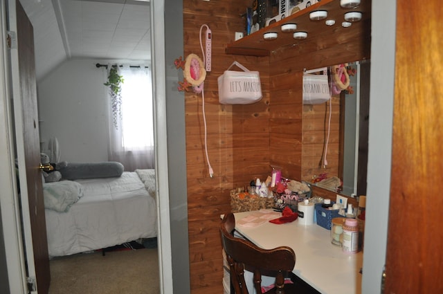 3329 120th Ave, Holland, MI 49424 - ensuite bathroom featuring wood walls and lofted ceiling