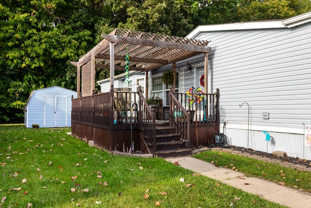 wooden deck featuring a pergola, a storage shed, and a lawn