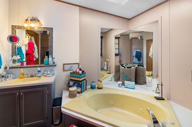 bathroom featuring a bathing tub and vanity