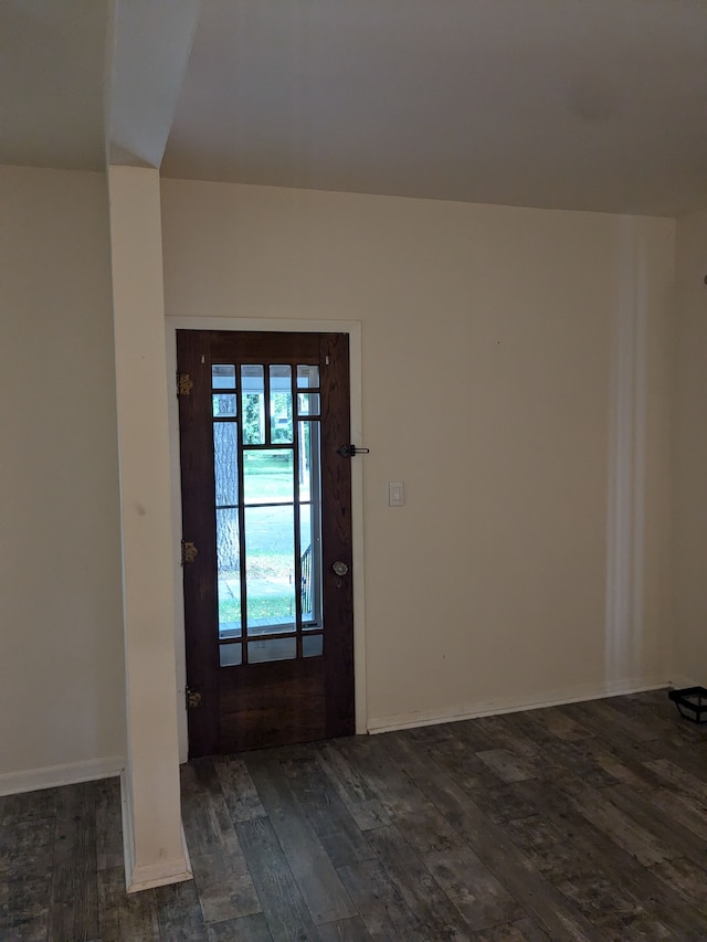 entrance foyer with dark hardwood / wood-style floors