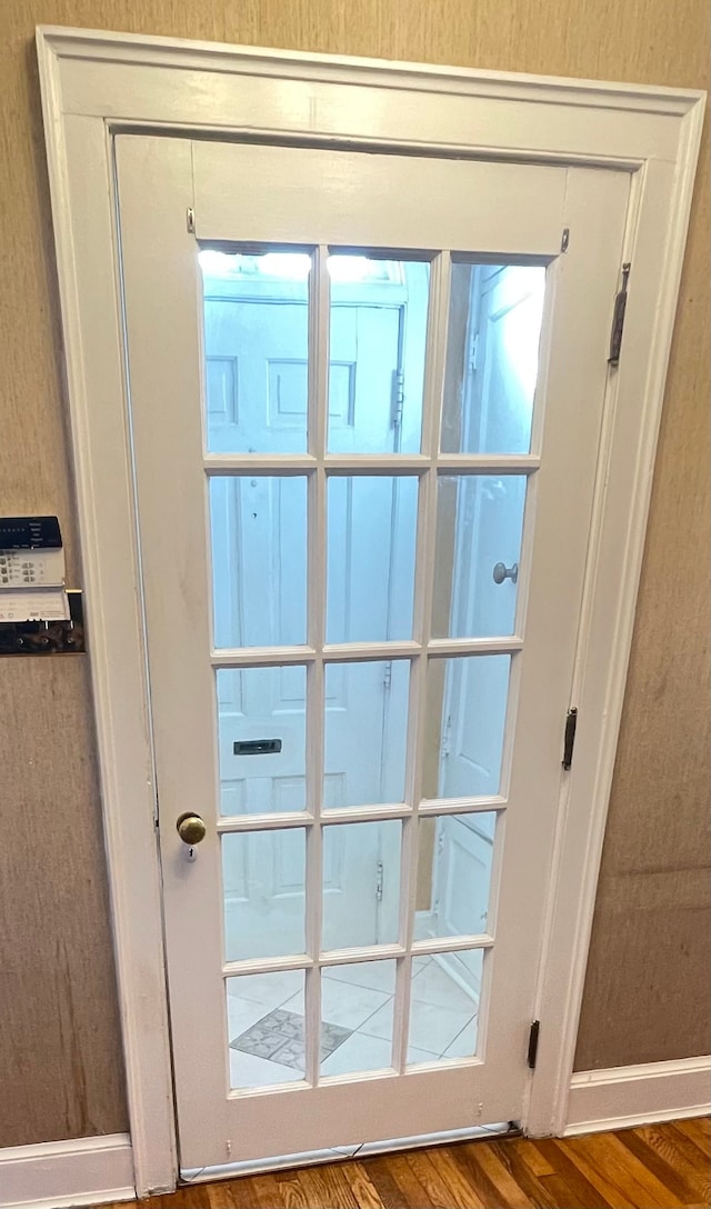 doorway to outside featuring hardwood / wood-style flooring