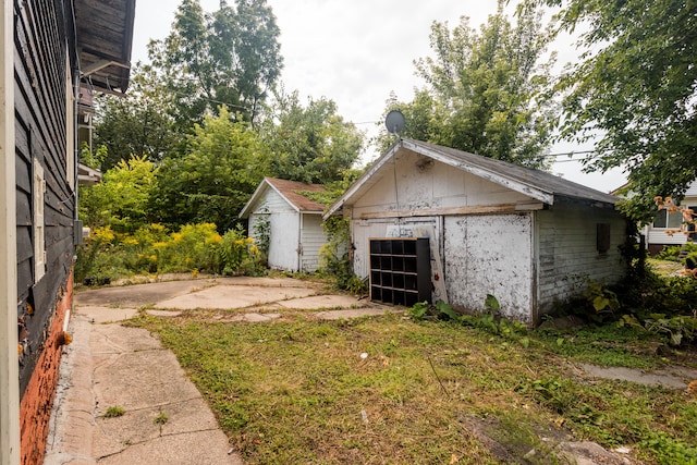 exterior space featuring a storage unit