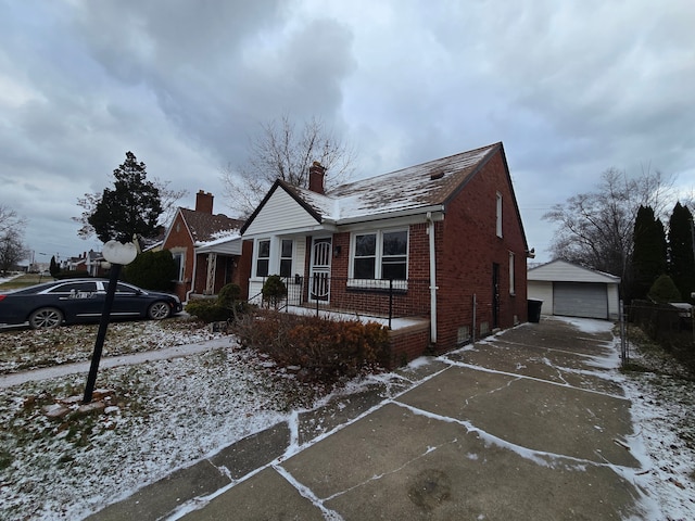 view of front of house featuring an outdoor structure and a garage