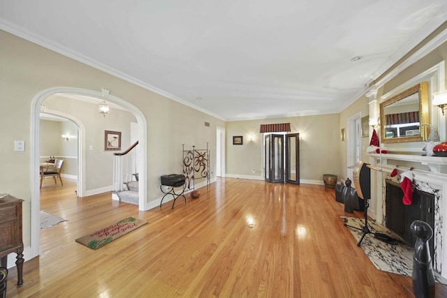 living room featuring crown molding and hardwood / wood-style flooring