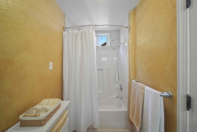 bathroom with shower / bathtub combination with curtain