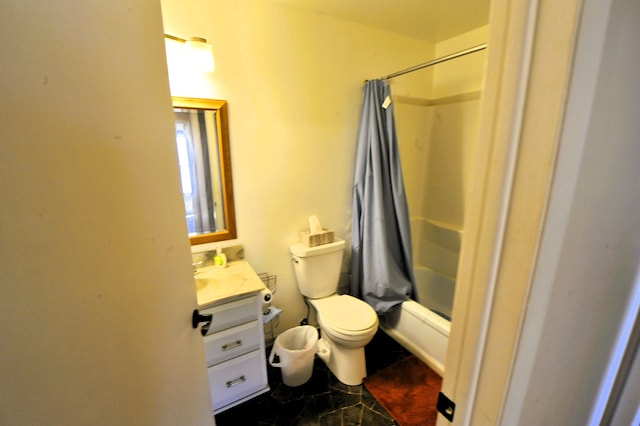 full bathroom with vanity, shower / bath combination with curtain, and toilet