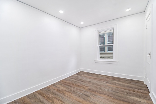 empty room with dark hardwood / wood-style floors