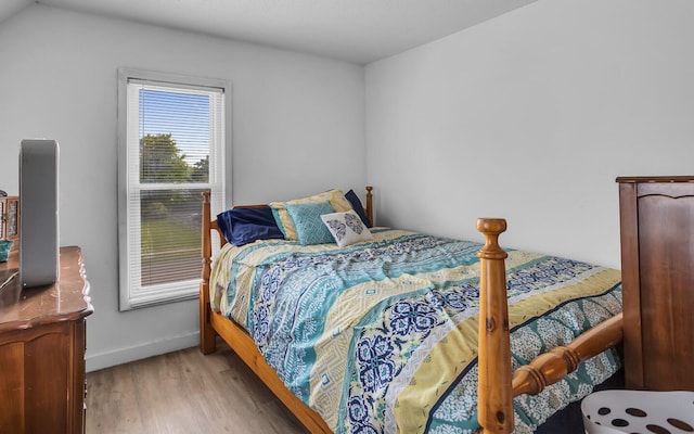 bedroom with light wood-type flooring