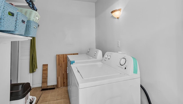 laundry room featuring separate washer and dryer