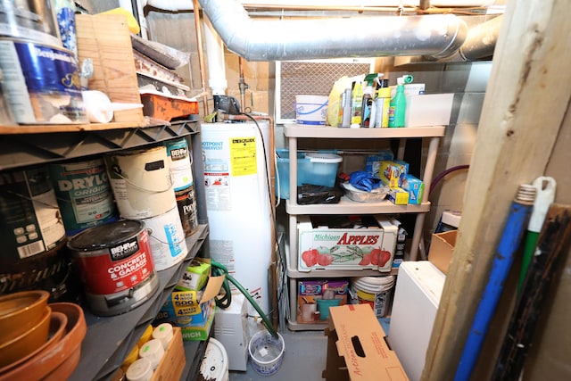 storage room featuring water heater