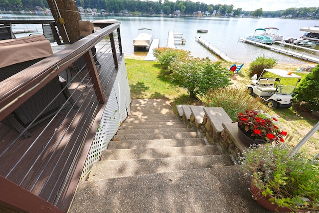 dock area with a water view