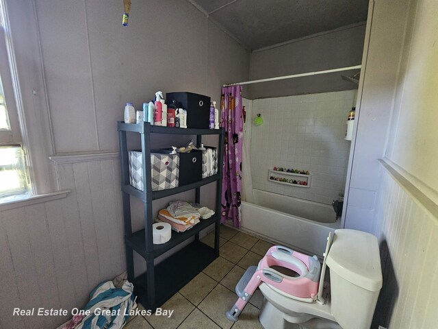 1209 S Fayette St, Saginaw, MI 48602 - full bath with tile patterned floors, toilet, and shower / bath combination with curtain