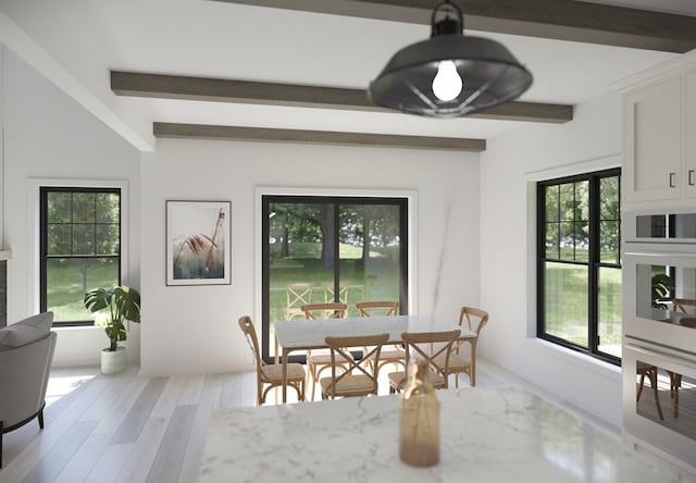46090 Sunset St, Northville, MI 48167 - dining space featuring beamed ceiling and light wood-type flooring