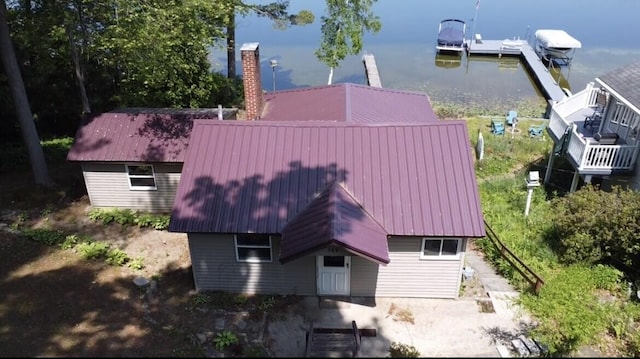 589 E Sidney Rd, Stanton, MI 48888 - view from above of property with a nearby body of water