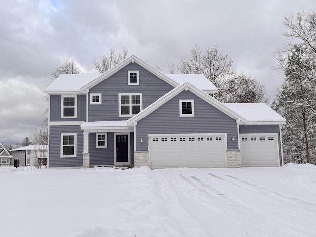 view of front of property featuring a garage