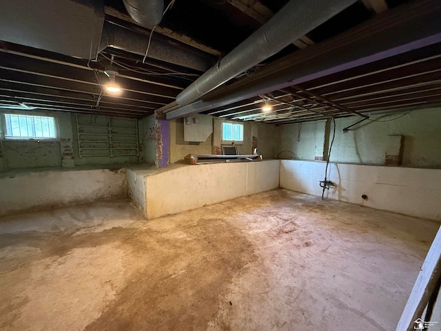 basement featuring plenty of natural light