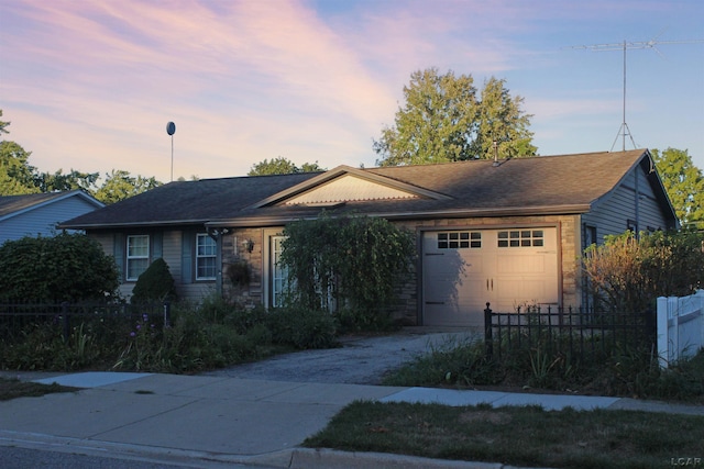 ranch-style home with a garage