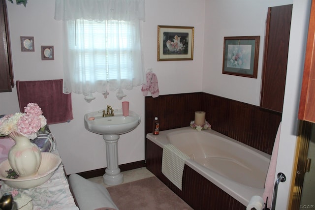 bathroom featuring a tub