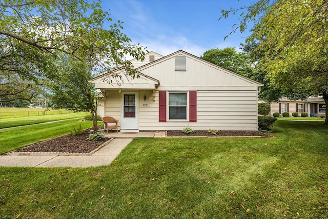 view of front of home with a front yard