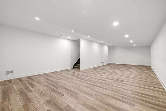 basement featuring light hardwood / wood-style floors