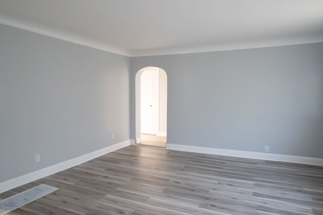 unfurnished room featuring light wood-type flooring