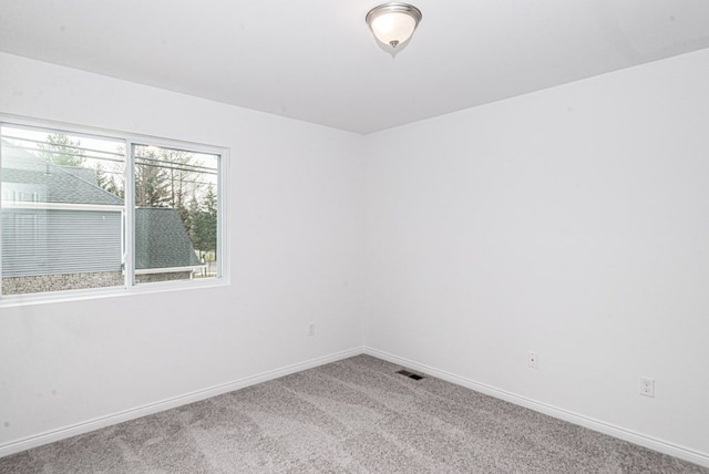 view of carpeted spare room