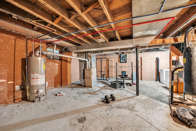 basement with gas water heater and heating unit