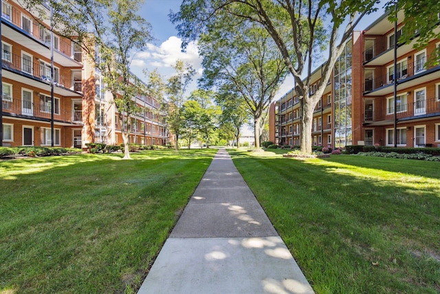 view of community with a lawn