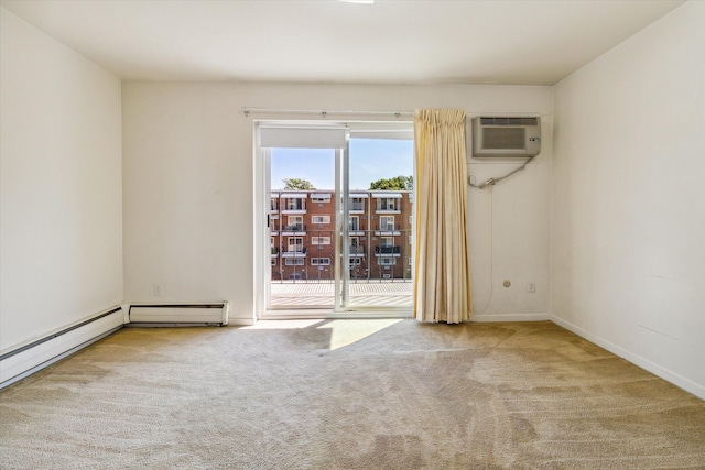 spare room with a wall mounted AC and carpet floors