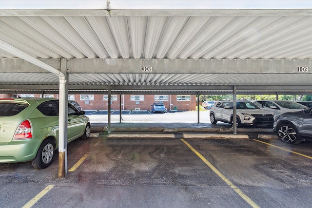 garage featuring a carport