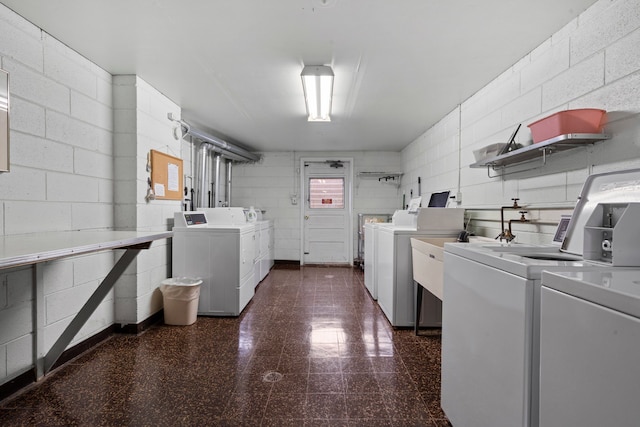 laundry area with washing machine and clothes dryer