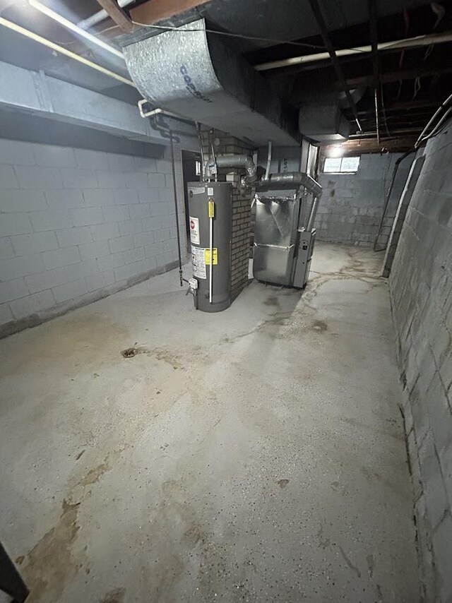 928 Mann Ave, Flint, MI 48503 - basement with water heater