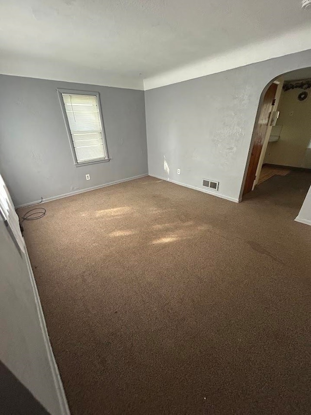 spare room with carpet