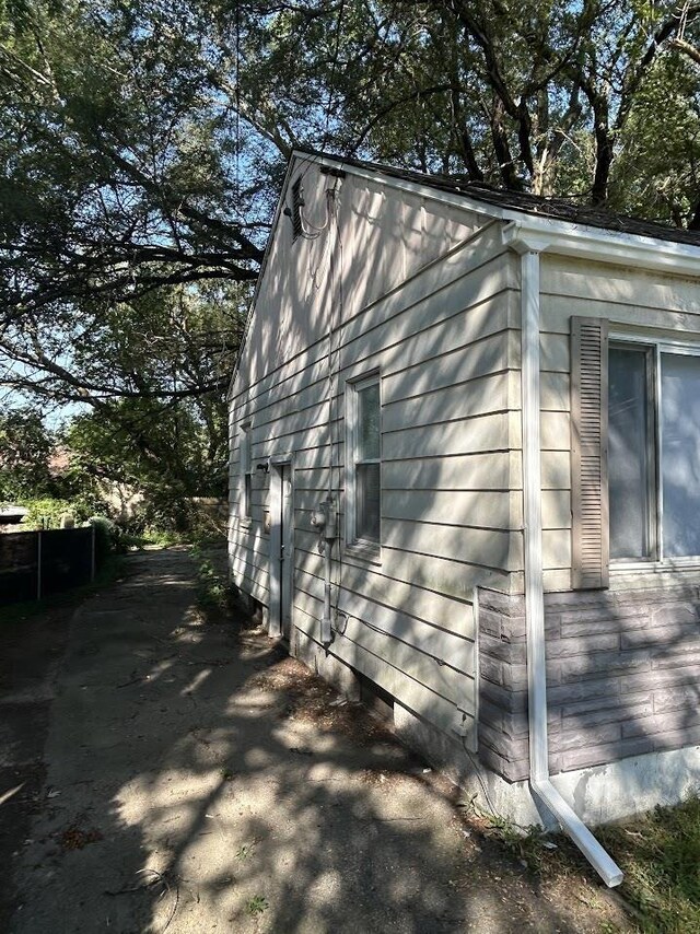 928 Mann Ave, Flint, MI 48503 - view of property exterior with crawl space