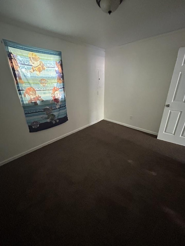 3288 Kissner Ave, Flint, MI 48504 - empty room with dark carpet and baseboards