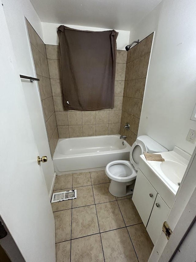 3288 Kissner Ave, Flint, MI 48504 - bathroom with tile patterned floors, shower / bath combination, vanity, and toilet