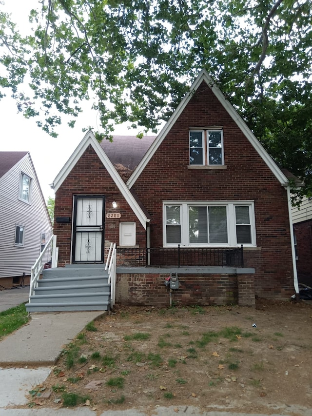 view of front of home featuring brick siding