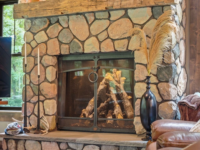 room details with a stone fireplace