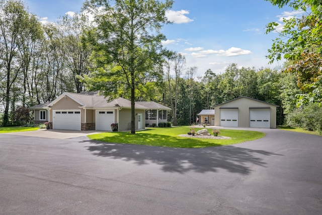 ranch-style house with a front lawn and a garage