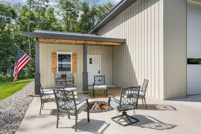 view of patio / terrace featuring a fire pit