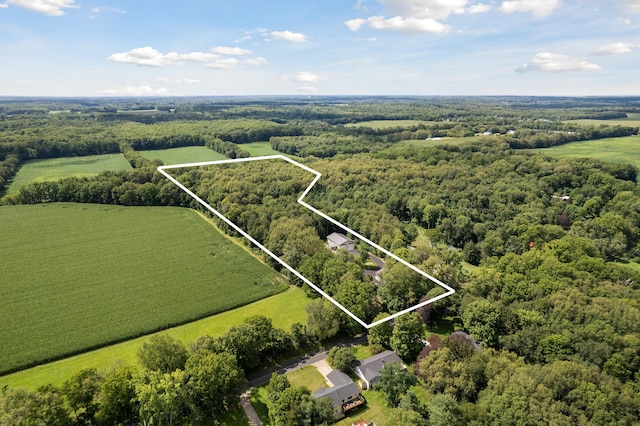 birds eye view of property featuring a rural view